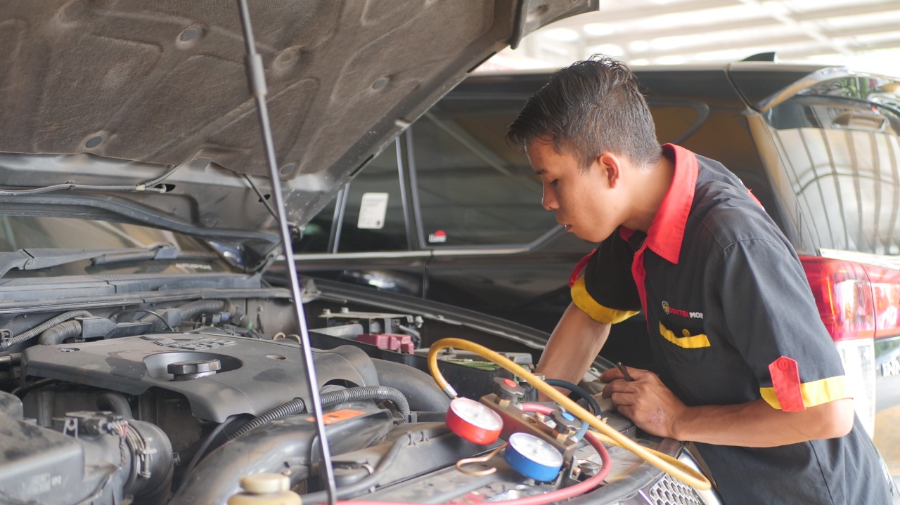 ac mobil bau kencing tikus