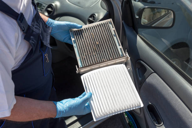 Membersihkan Filter AC Mobil